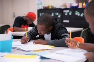 Man works on literacy exercises at Seeds of Literacy in Cleveland